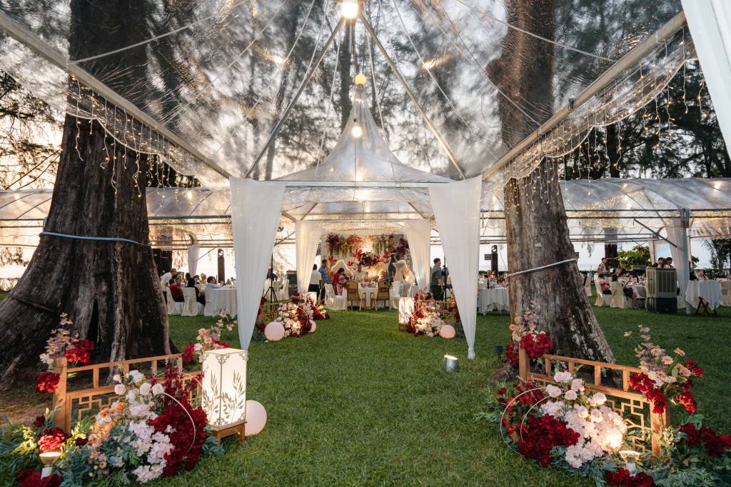 Romantic portrait among the white breeze block architecture during traditional Chinese wedding reception at Lone Pine Hote...